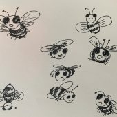 sketch of different bee faces